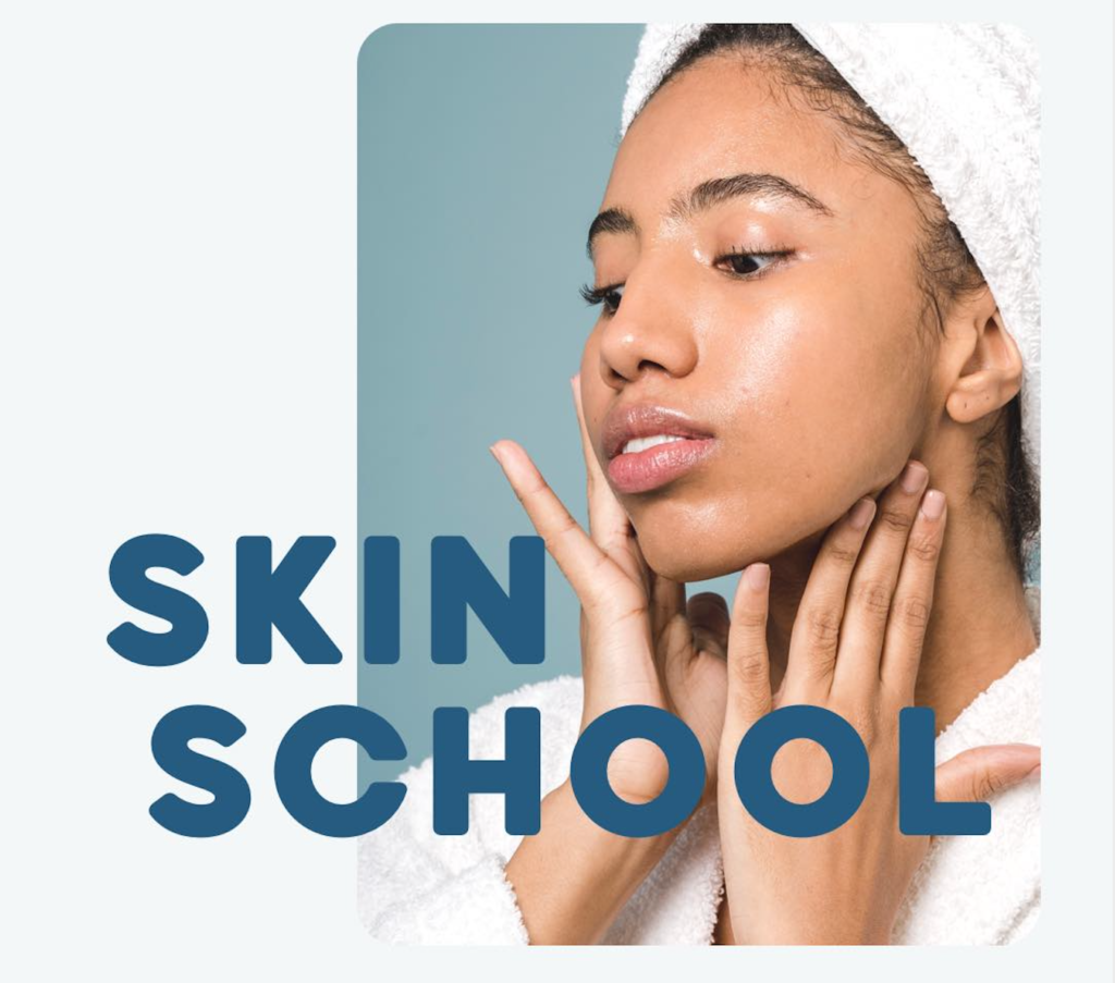 A woman applies product to her skin with the words "skin school" overlayed on the image