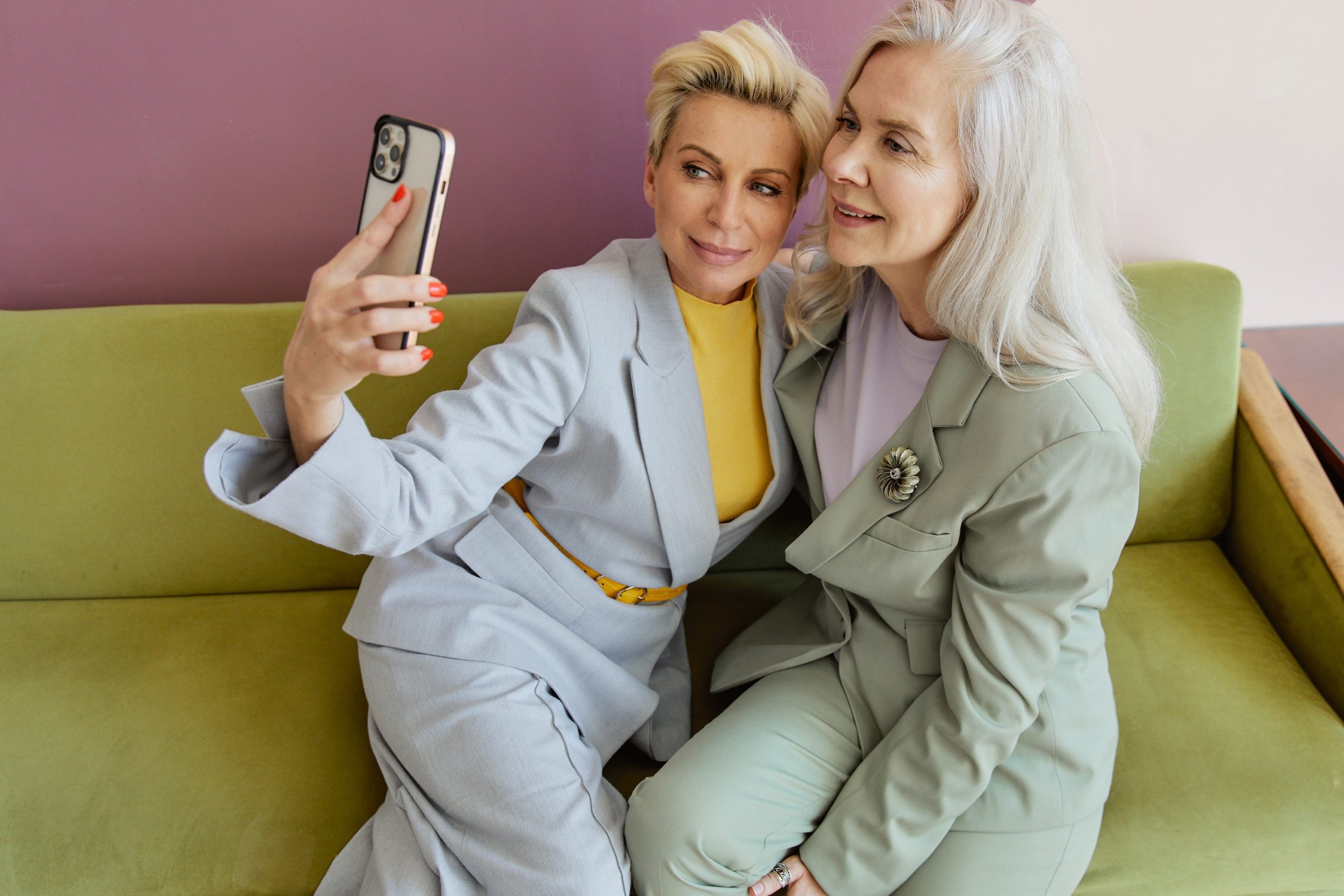 two mature attractive women take a selfie together